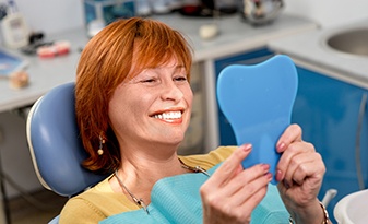 Long term benefits of dental implants include a cost savings over time.
